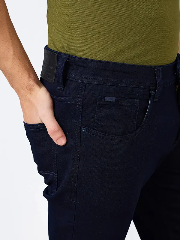 SPYKAR solid navy slim fit denim jeans for men