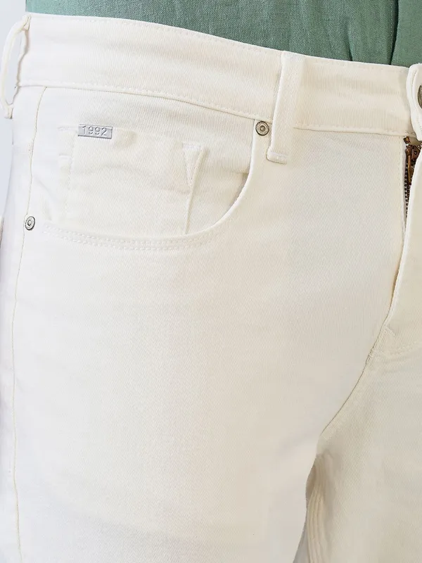 SPYKAR solid white slim fit denim jeans for men