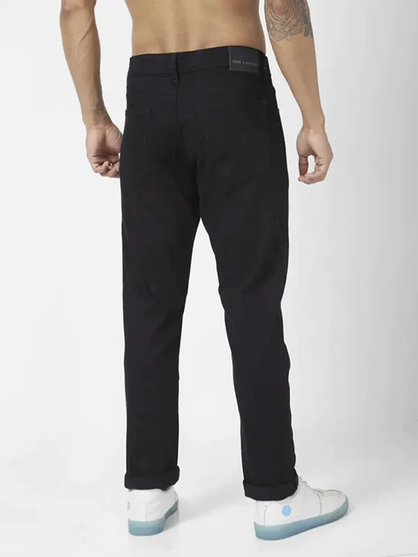 Spykar stylish black slim fit jeans in solid