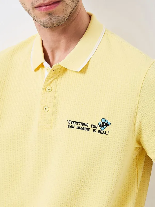 SPYKAR textured yellow slim fit polo t-shirt