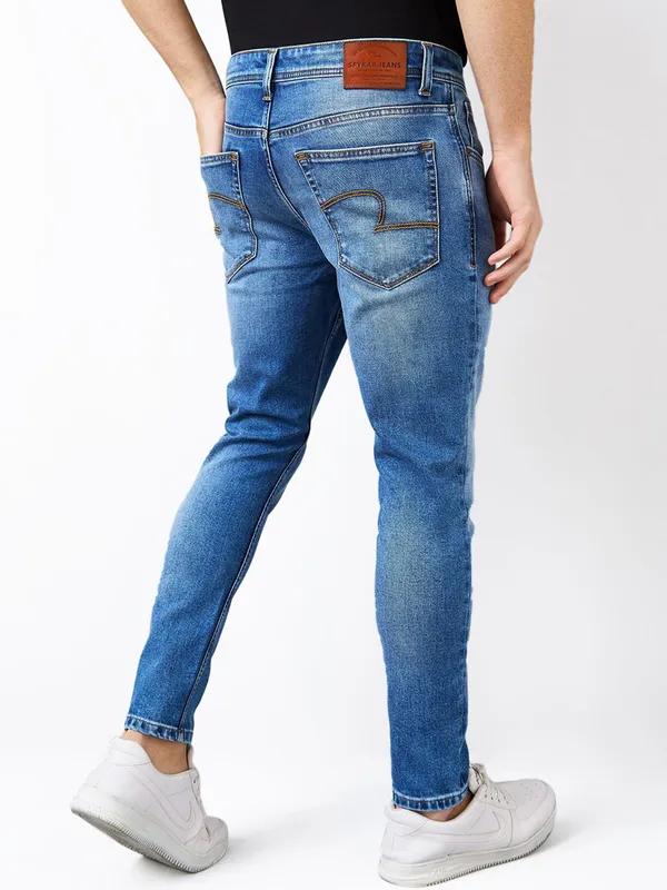 SPYKAR washed mid blue slim fit denim for men