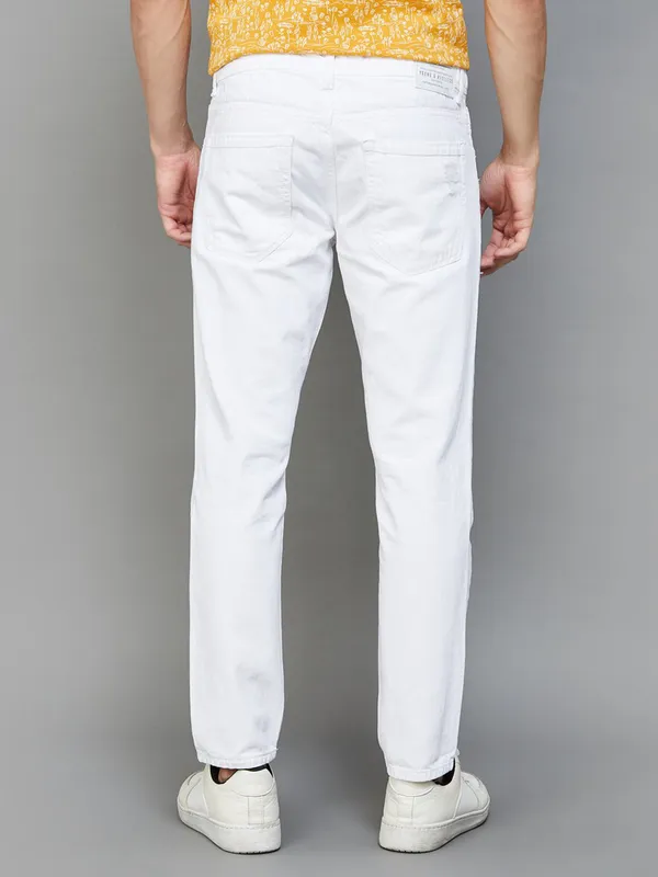Spykar white ripped slim tapered fit jeans