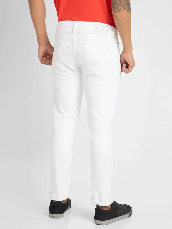 Spykar white solid skinny fit jeans