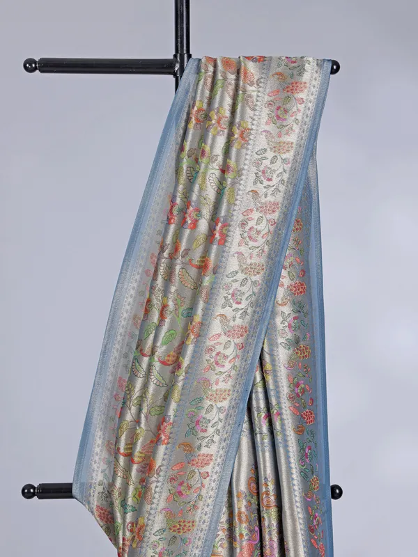 Stone blue shimmer dola silk saree with zari and print