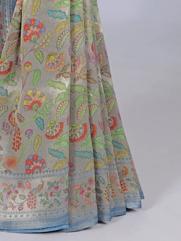 Stone blue shimmer dola silk saree with zari and print