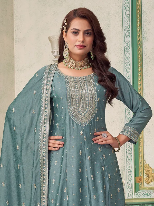 Stone green silk suit with quarter sleeves and dupatta