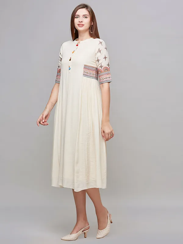 Stunning beige embroidery cotton kurti