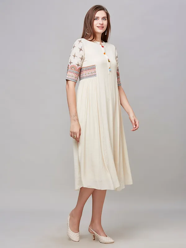 Stunning beige embroidery cotton kurti