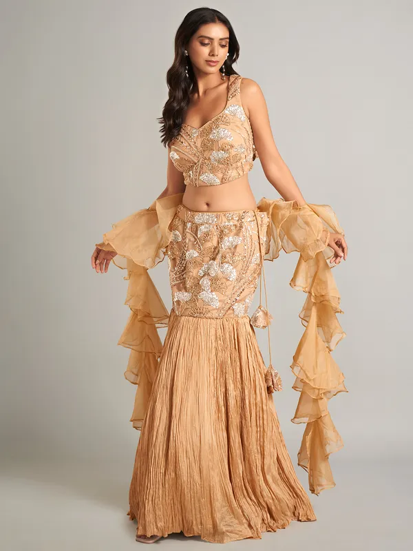 Stunning beige lehenga choli with ruffle dupatta