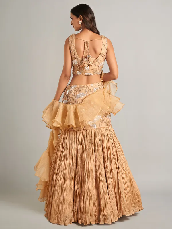 Stunning beige lehenga choli with ruffle dupatta