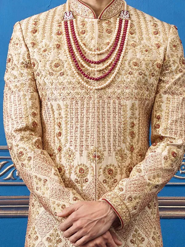 Stunning beige silk groom sherwani