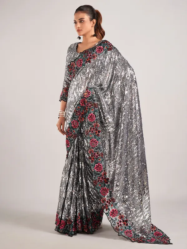 Stunning black net with sequins saree