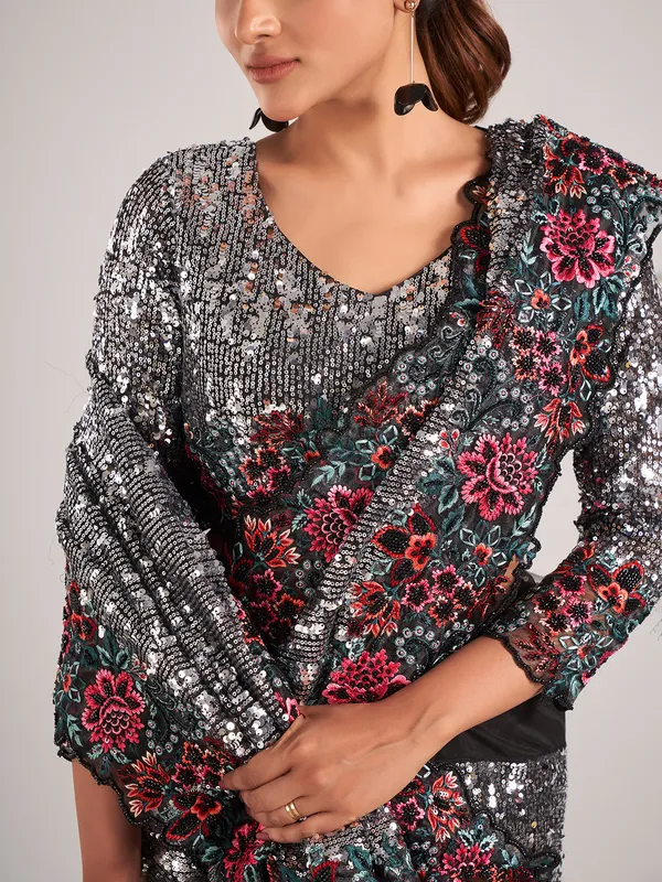 Stunning black net with sequins saree