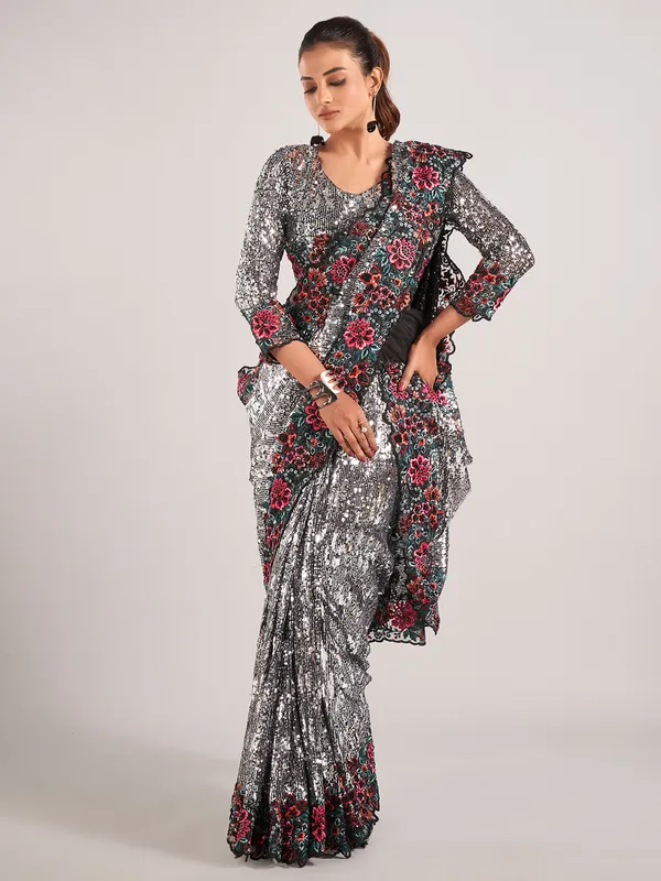 Stunning black net with sequins saree