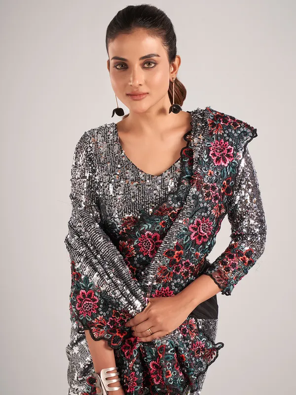Stunning black net with sequins saree