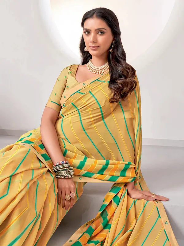 Stunning cream georgette stripe saree