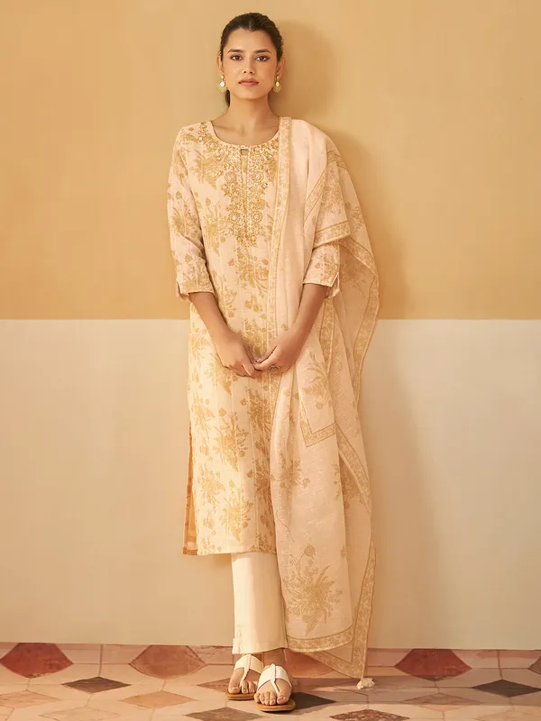 Stunning cream kurti set in silk with heavy work