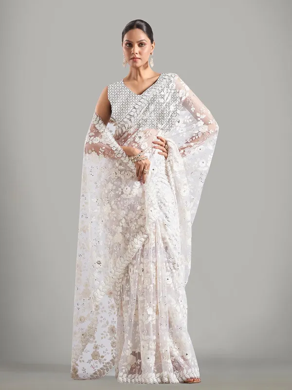 Stunning cream net saree for reception