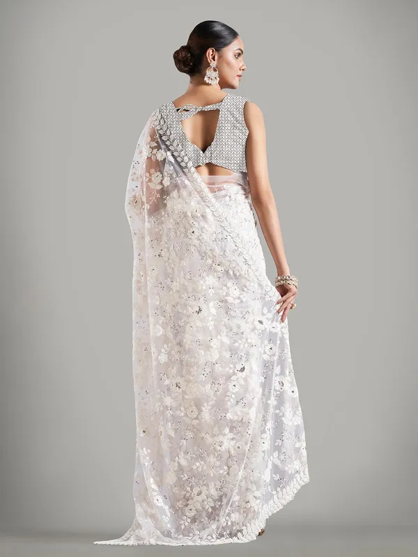 Stunning cream net saree for reception
