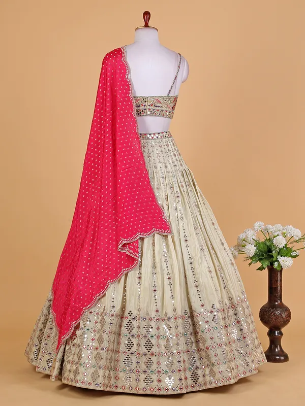 Stunning cream tissue silk lehenga choli