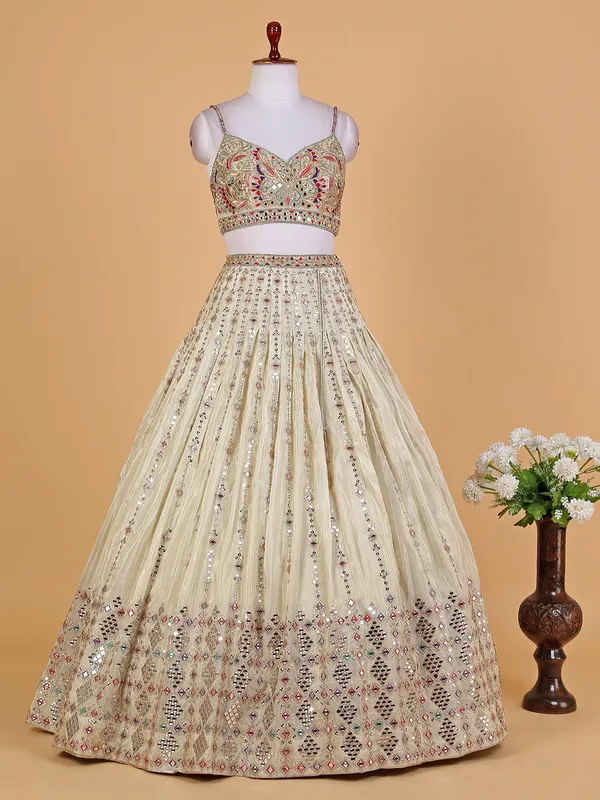 Stunning cream tissue silk lehenga choli