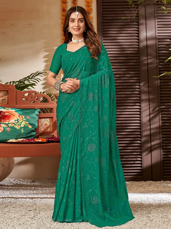 Stunning dark green chiffon saree