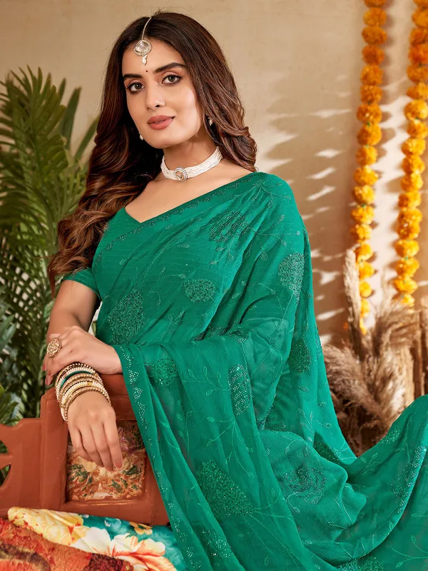 Stunning dark green chiffon saree