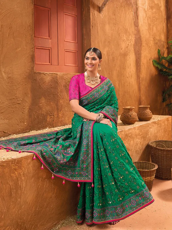 Stunning dark green kachhi work saree