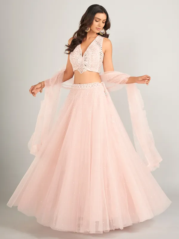 Stunning light pink net lahenga choli