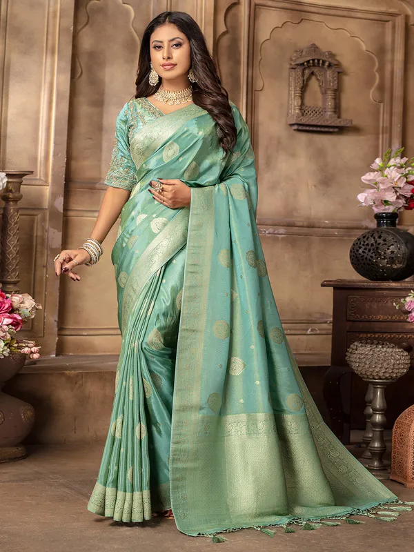 Stunning mint green tissue silk saree