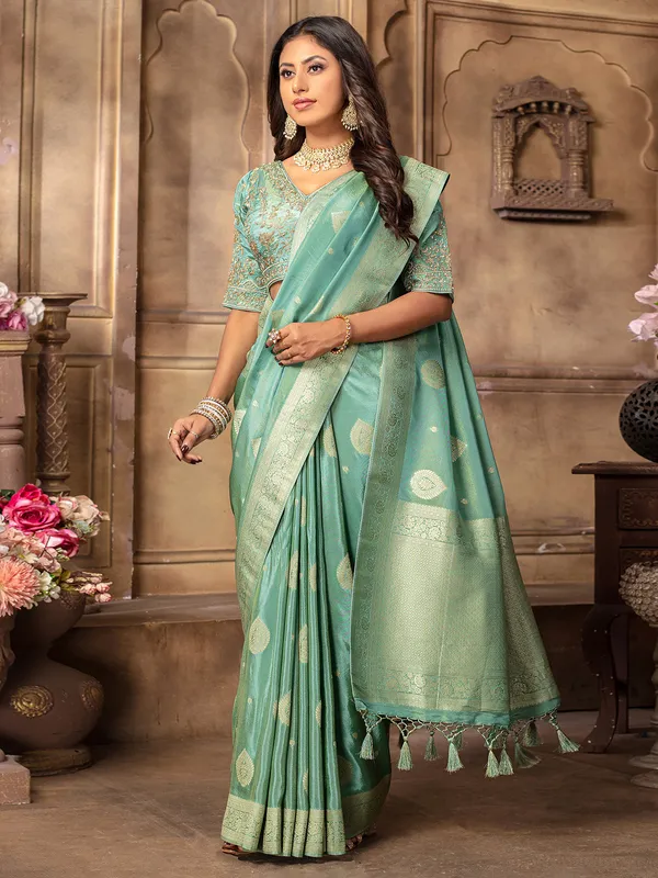 Stunning mint green tissue silk saree