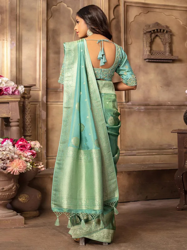 Stunning mint green tissue silk saree