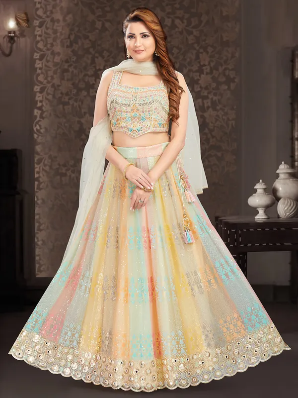 Stunning multi color net lehenga choli