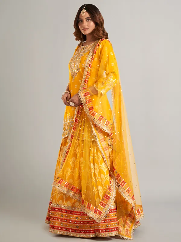 Stunning mustard yellow silk lehenga suit