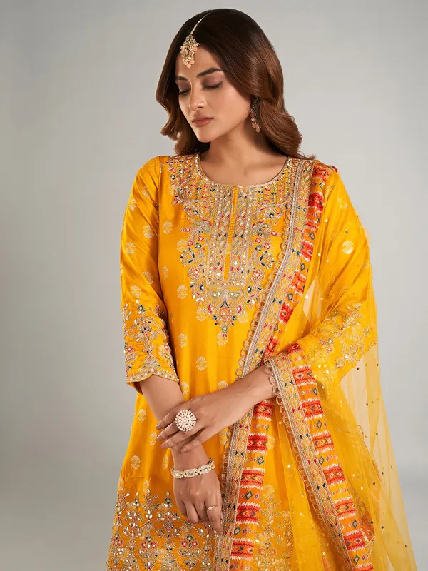 Stunning mustard yellow silk lehenga suit