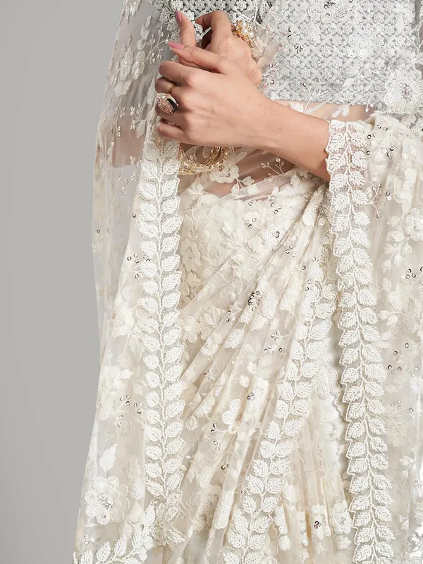 Stunning net white saree