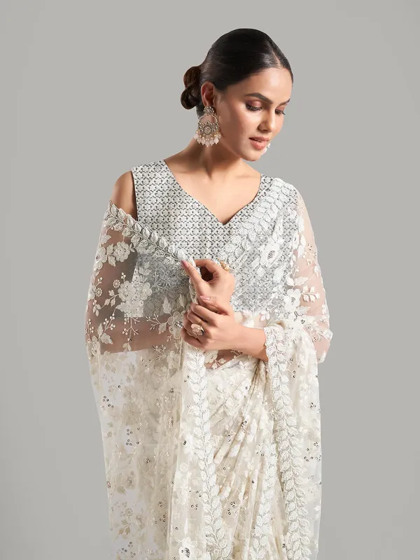 Stunning net white saree