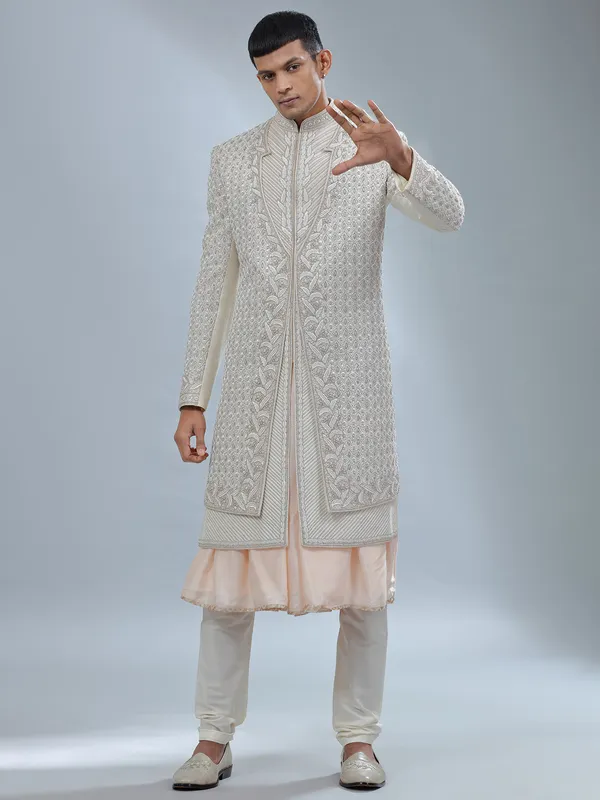 Stunning Off white and peach silk peshwai sherwani