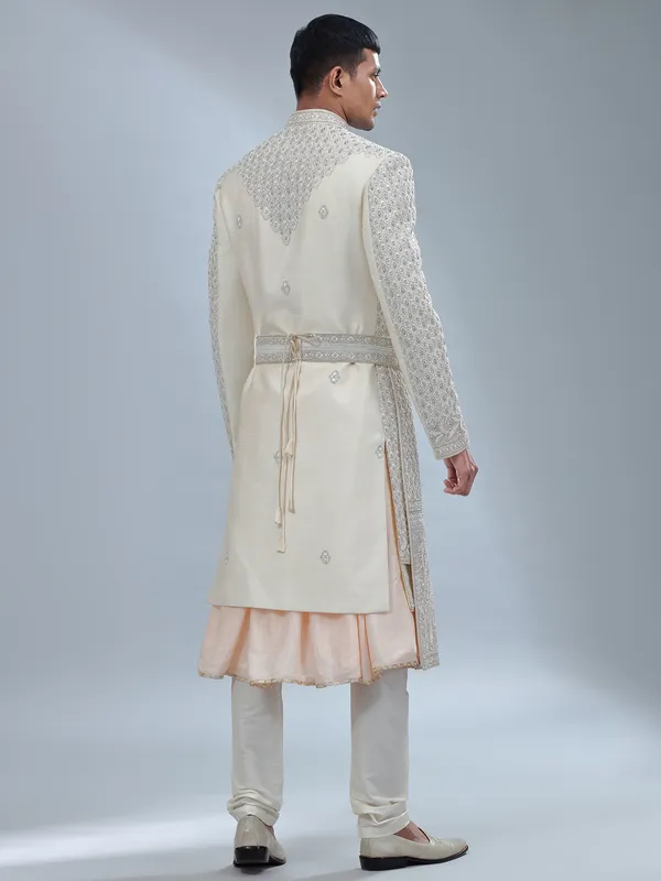 Stunning Off white and peach silk peshwai sherwani