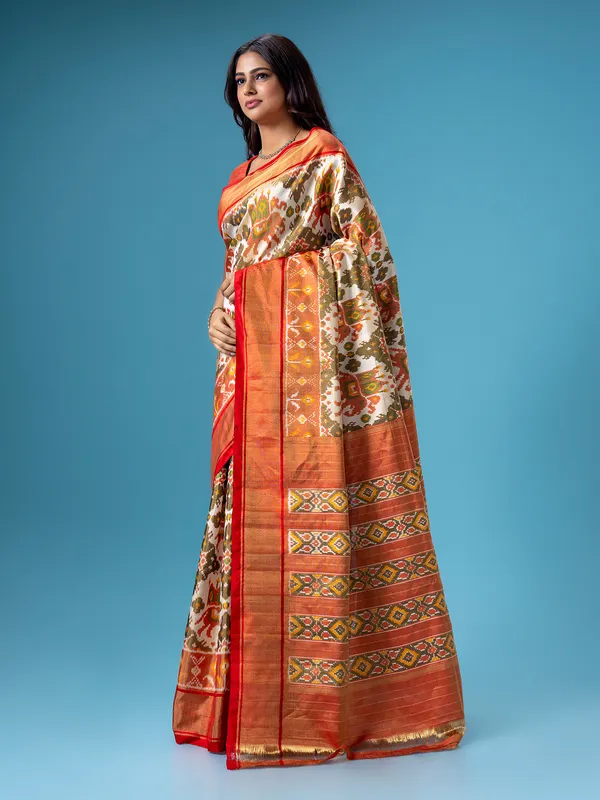 Stunning off white patola printed saree