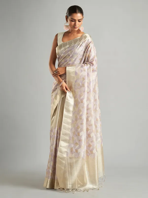 Stunning off-white tissue silk saree