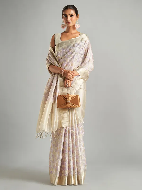 Stunning off-white tissue silk saree