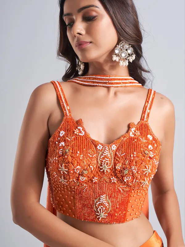 Stunning orange lehenga choli with dupatta