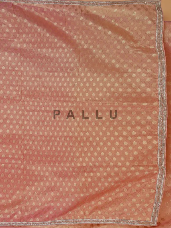 Stunning peach chiffon saree for wedding