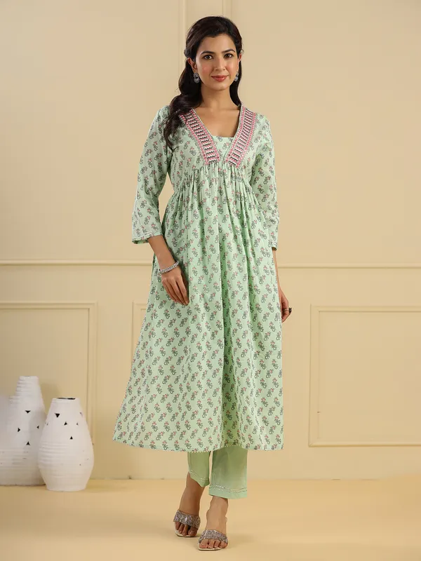 Stunning pista green cotton kurti set