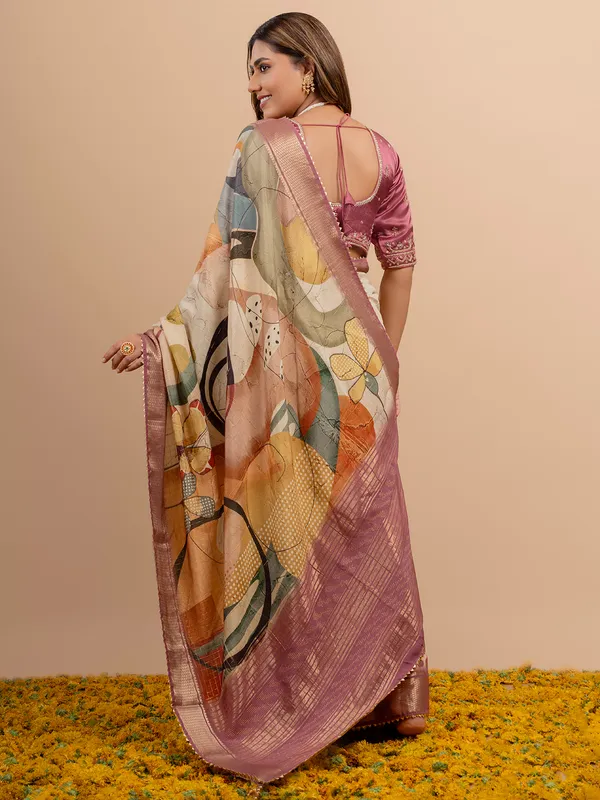 Stunning purple and beige dola silk saree