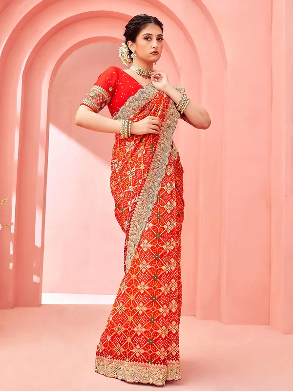 Stunning red bandhej printed saree