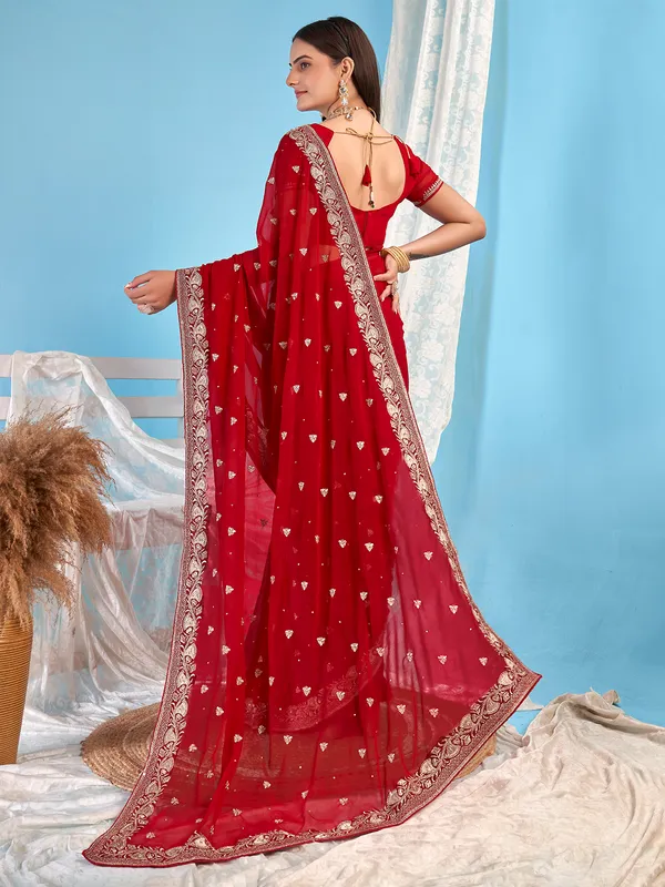 Stunning red embroidery georgette saree