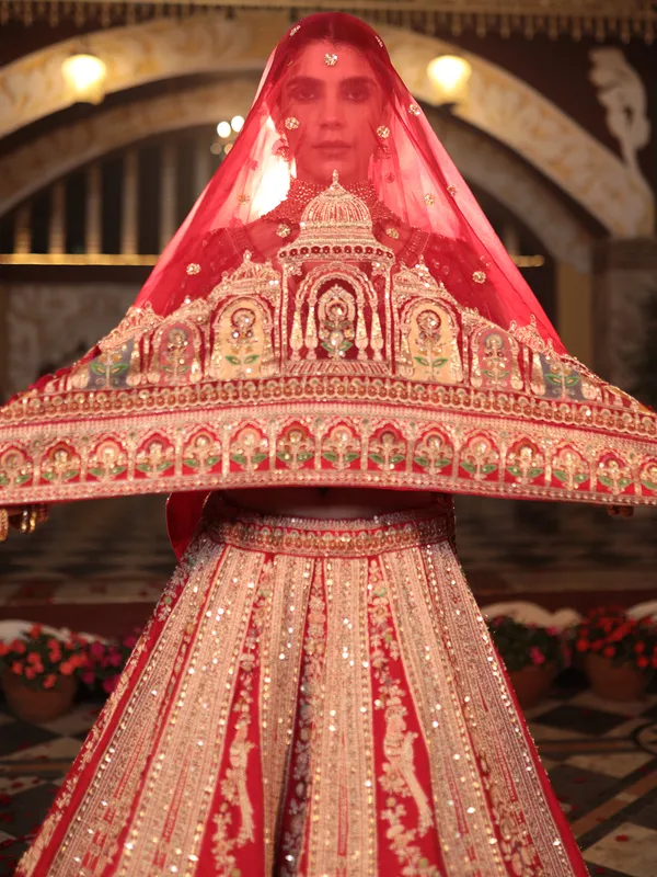 Stunning red lahenga choli in raw silk