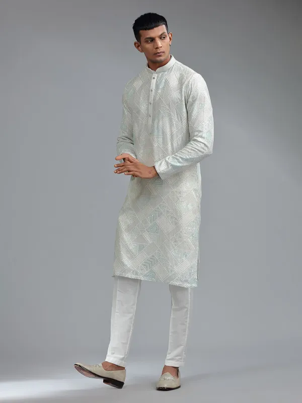 Stunning sea green silk kurta suit